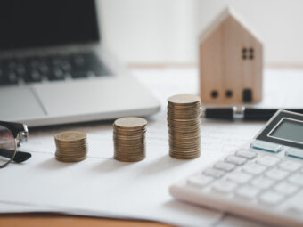 Stacked of Coins ,Income Tax Raise Concept.